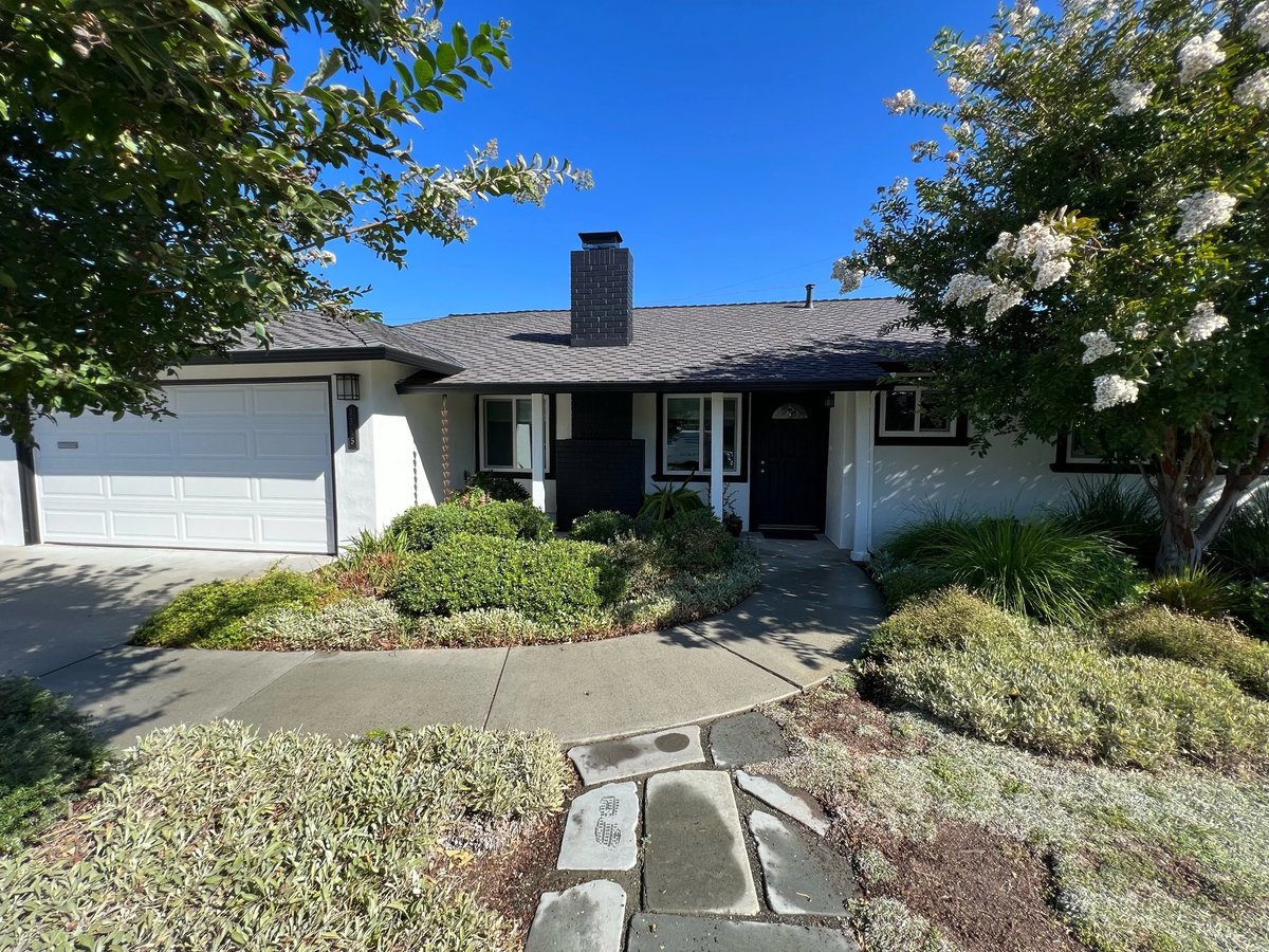 Single story ranch home with fresh exterior paint