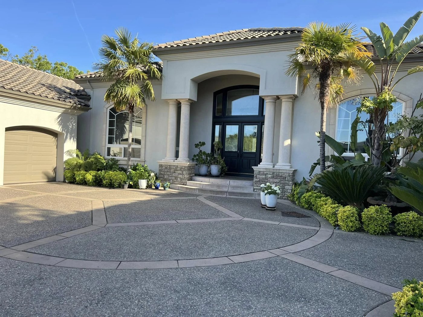 Large villa with painted stucco and columns